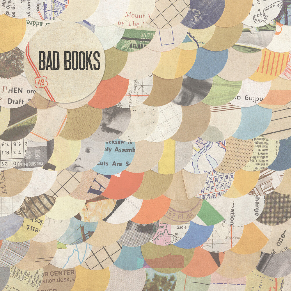 the album cover for Bad Books - Bad Books (Cream with Orange, Yellow, Blue Splatter)