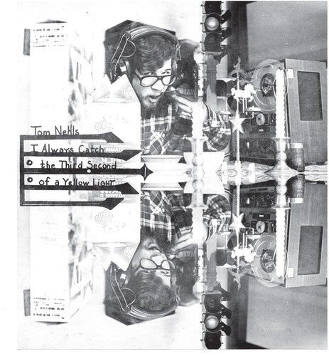 the album cover for Tom Nehls - I Always Catch the Third Second of a Yellow Light