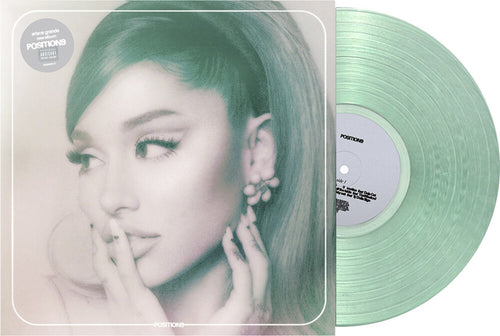 the album cover for Ariana Grande - Positions [Coke Bottle Clear LP]
