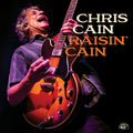 the album cover for Chris Cain - Raisin' Cain