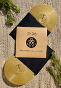 the album cover for Tom Petty - Finding Wildflowers: Alternate Versions [Indie Exclusive Limited Edition Gold 2LP]
