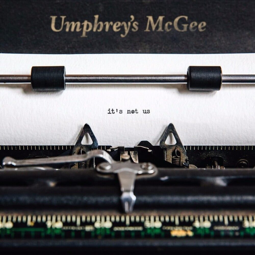 the album cover for Umphrey's McGee - It's Not Us