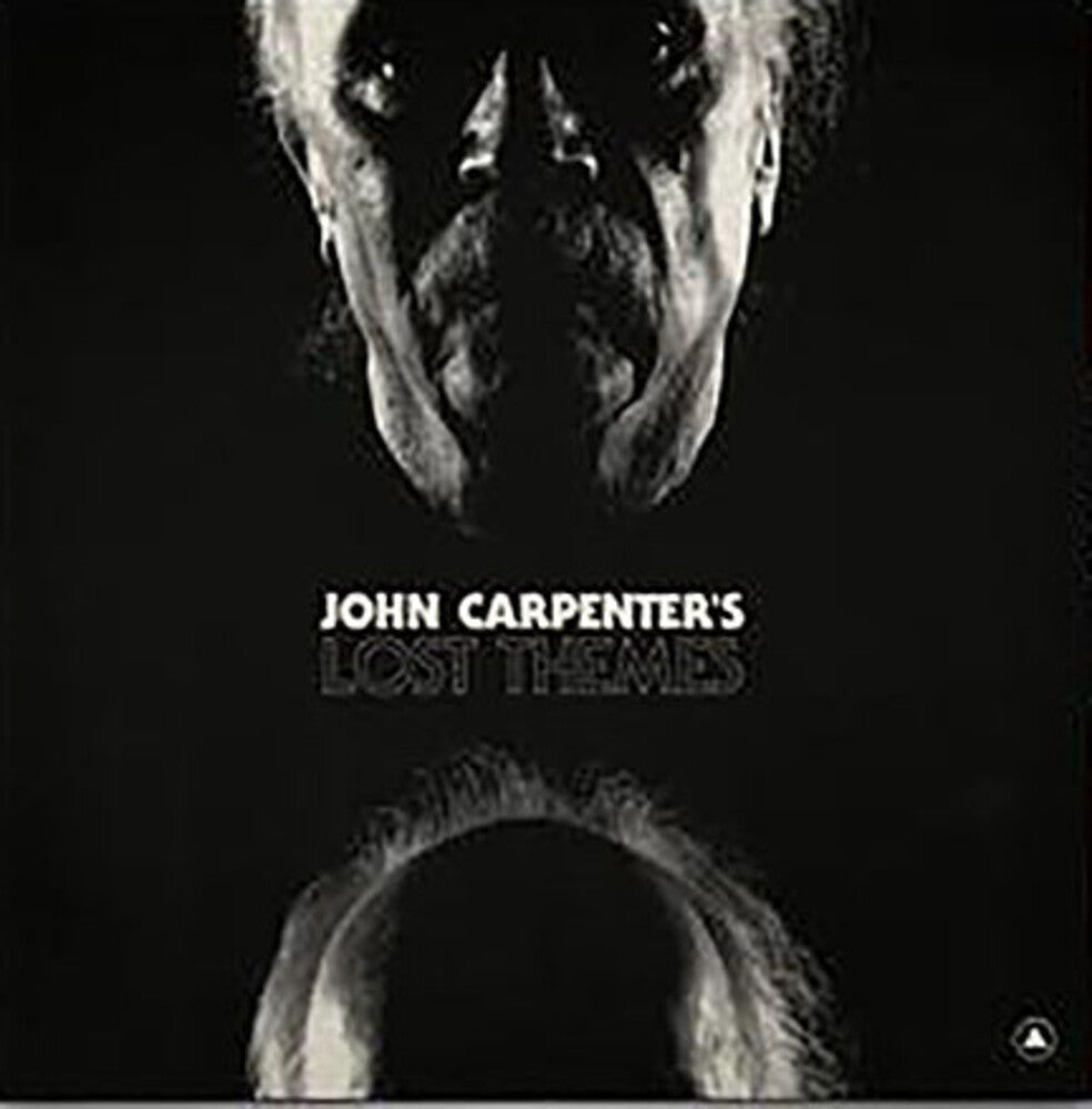 the album cover for John Carpenter - Lost Themes [Colored Vinyl] [Limited Edition] (Red) (Uk)