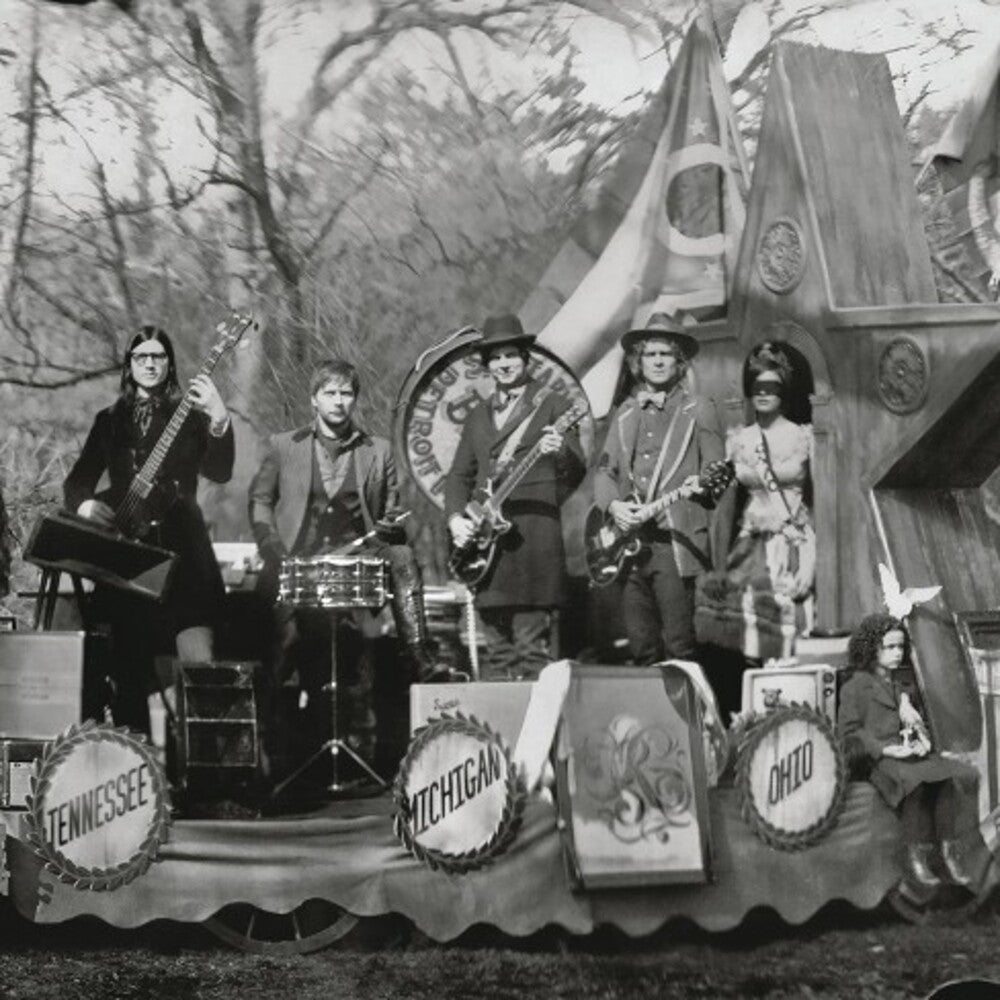 the album cover for The Raconteurs - Consolers Of The Lonely