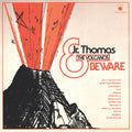 the album cover for Jr. Thomas & The Volcanos - Beware (Transparent Orange Vinyl) [Colored Vinyl] (Org)