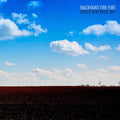 the album cover for Backyard Tire Fire - Black Dirt Blue Sky