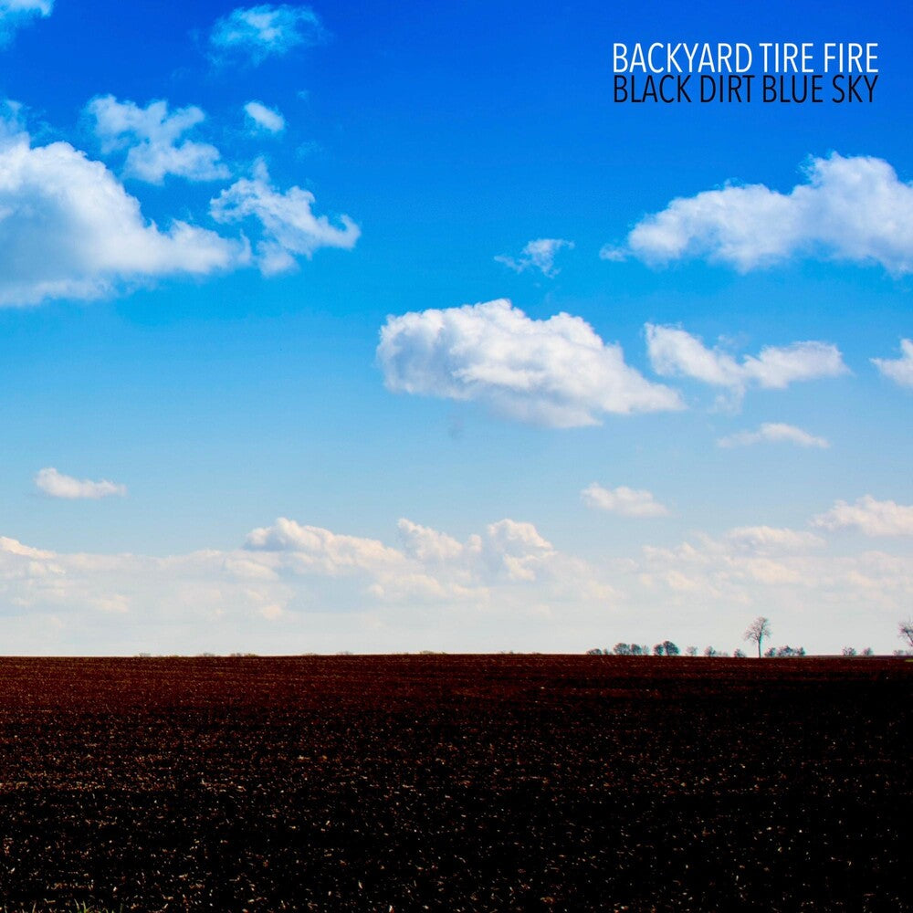 the album cover for Backyard Tire Fire - Black Dirt Blue Sky