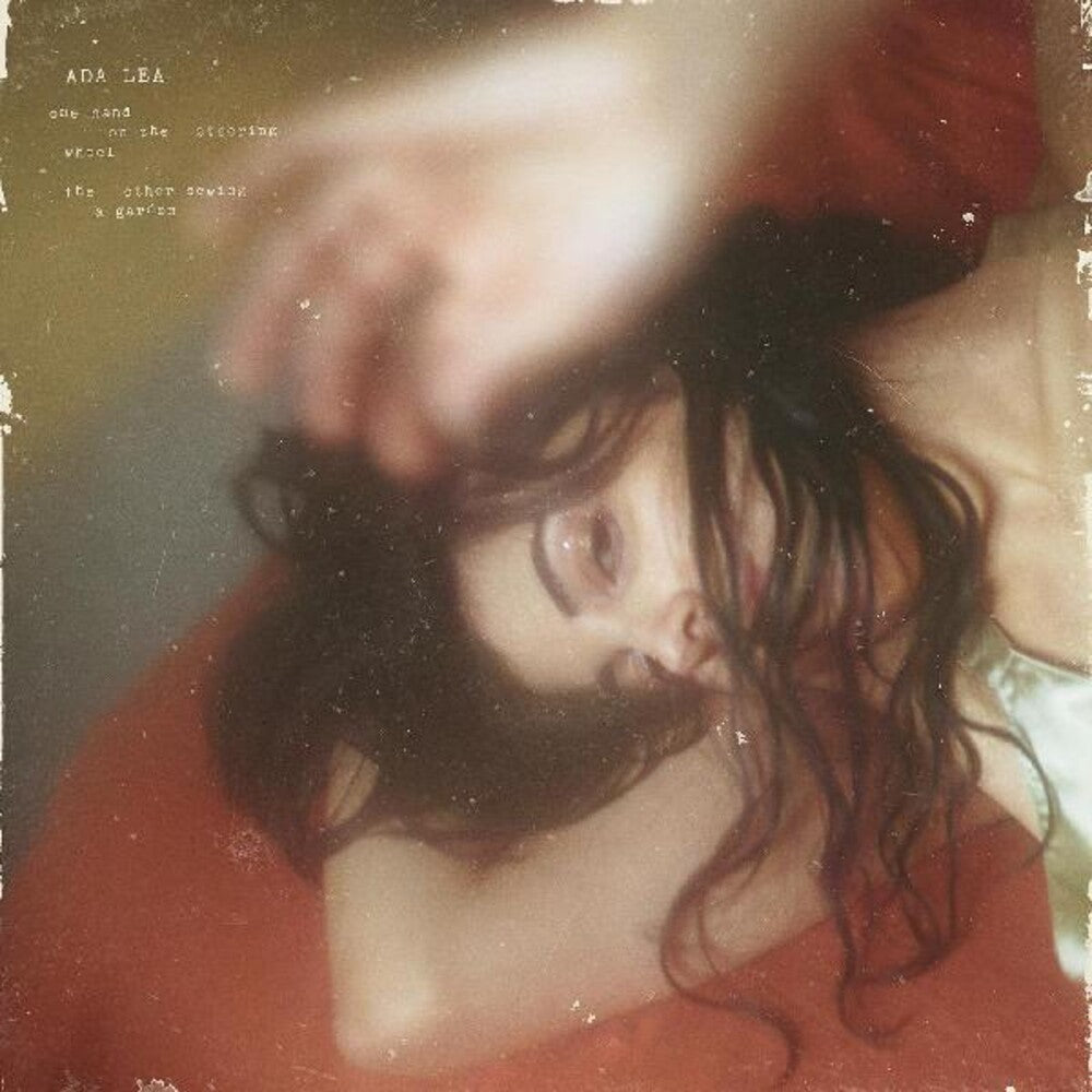 the album cover for Ada Lea - one hand on the steering wheel the other sewing a garden