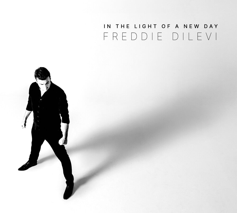 the album cover for Freddie Dilevi - In The Light Of A New Day