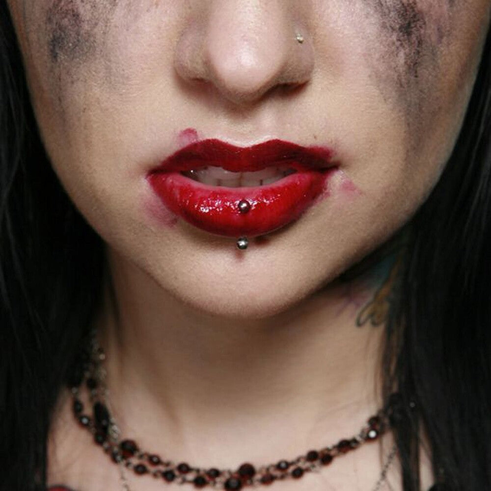 the album cover for Escape The Fate - Dying Is Your Latest Fashion:15th Anniversary Edition [Opaque Red LP]