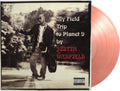 the album cover for Warfield, Justin - My Field Trip To Planet 9 [Limited Gatefold, 180-Gram Crystal Clear & Solid Red Marble Colored Vinyl]