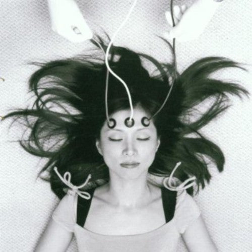 the album cover for Yuka Honda - Memories Are My Only Witness