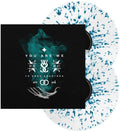 the album cover for While She Sleeps - You Are We (Clear & Sea Blue Splatter Vinyl)