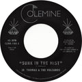 the album cover for Jr. Thomas & The Volcanos - Sunk In The Mist (Creamcircle) [Colored Vinyl] (Wht)
