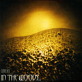 the album cover for In the Woods... - Omnio [With Booklet] [Digipak]