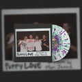the album cover for Mom Jeans. - Puppy Love [White w/ Green & Purple Splatter LP]