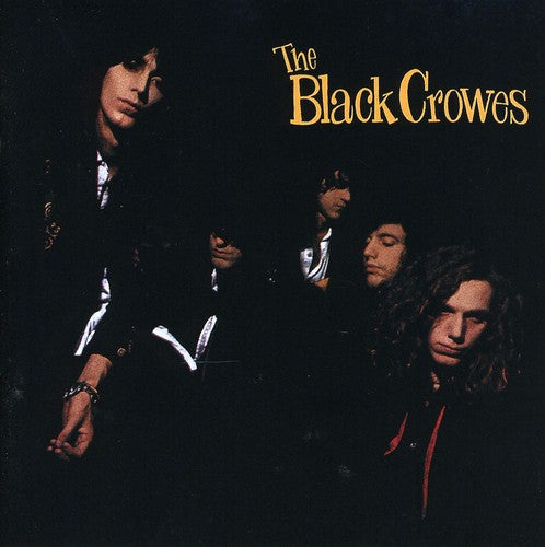 the album cover for The Black Crowes - Shake Your Money Maker
