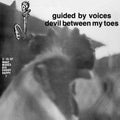 the album cover for Guided By Voices - Devil Between My Toes (colored Vinyl)