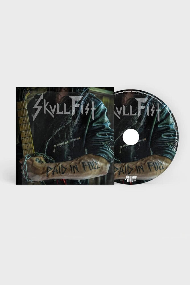 the album cover for Skull Fist - Paid In Full