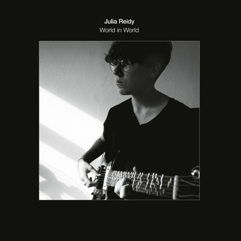 the album cover for Julia Reidy - World In World