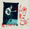 the album cover for Ani DiFranco - Living In Clip