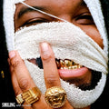 the album cover for Genesis Owusu - Smiling With No Teeth [180 Gram]