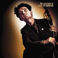 the album cover for Woody Guthrie - This Machine Kills Fascists - Gold/Black Splatter