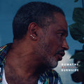 the album cover for Duwayne Burnside - Acoustic Burnside - Clear & Purple Splatter [Colored Vinyl]