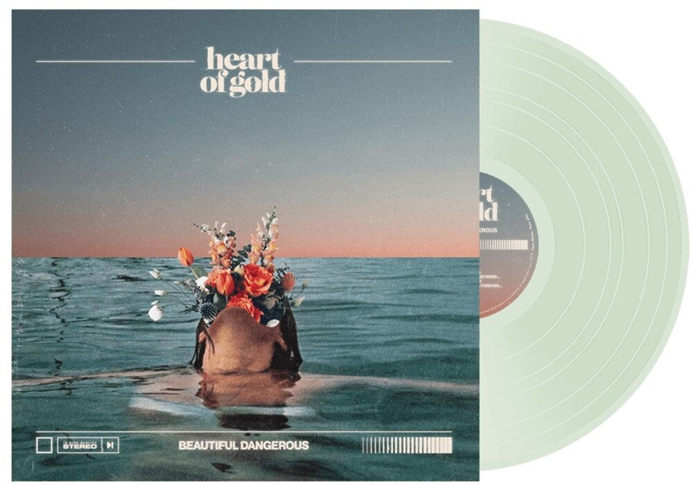 the album cover for Heart Of Gold - Beautiful Dangerous - Coke Bottle Green