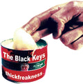 the album cover for The Black Keys - Thickfreakness [Limited Edition Pink LP]