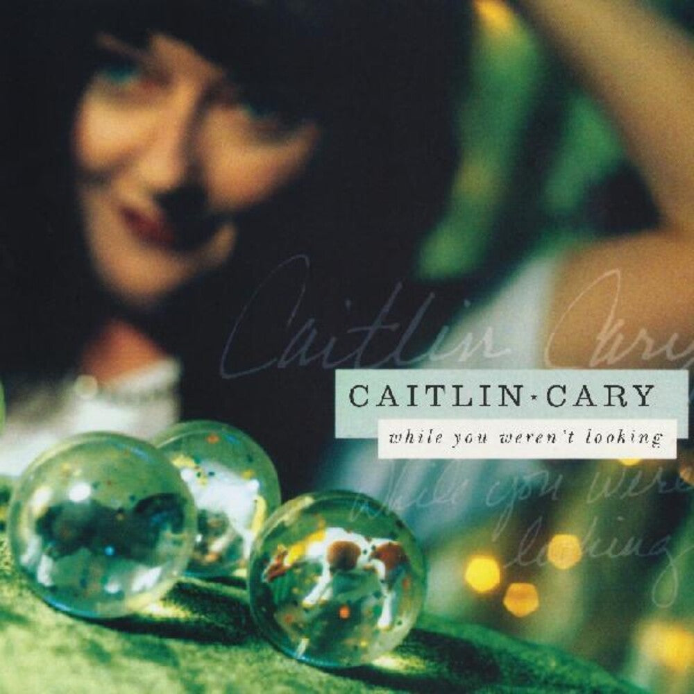 the album cover for Caitlin Cary - While You Weren't Looking