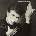 the album cover for David Bowie - Heroes: 2017 Remaster [Indie Exclusive Limited Edition Grey LP]