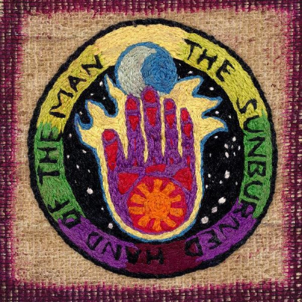 the album cover for The Sunburned Hand of the Man - Headdress