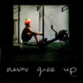 the album cover for Chronixx - Never Give Up (Uk)