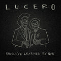 the album cover for Lucero - Should've Learned By Now [Indie Exclusive Limited Edition Silver LP]