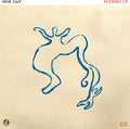 the album cover for Fucked Up - One Day [Indie Exclusive Limited Edition Peak Blue In Milky Clear LP]