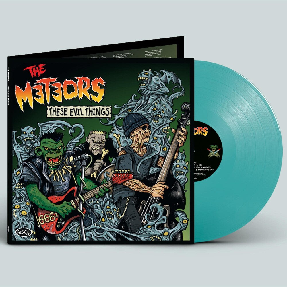 the album cover for The Meteors - These Evil Things