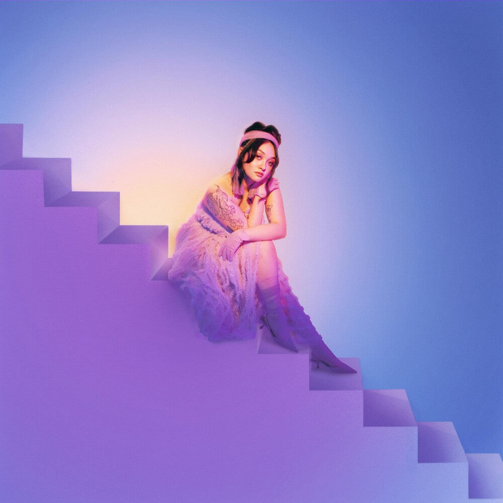the album cover for mxmtoon - Rising [Indie Exclusive Limited Edition Opaque Orange LP]