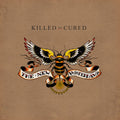 the album cover for New Amsterdams - Killed Or Cured - Brown & White (Brwn) [Colored Vinyl]