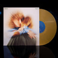 the album cover for Tennis - Pollen [Metallic Gold Pollen Yellow LP]