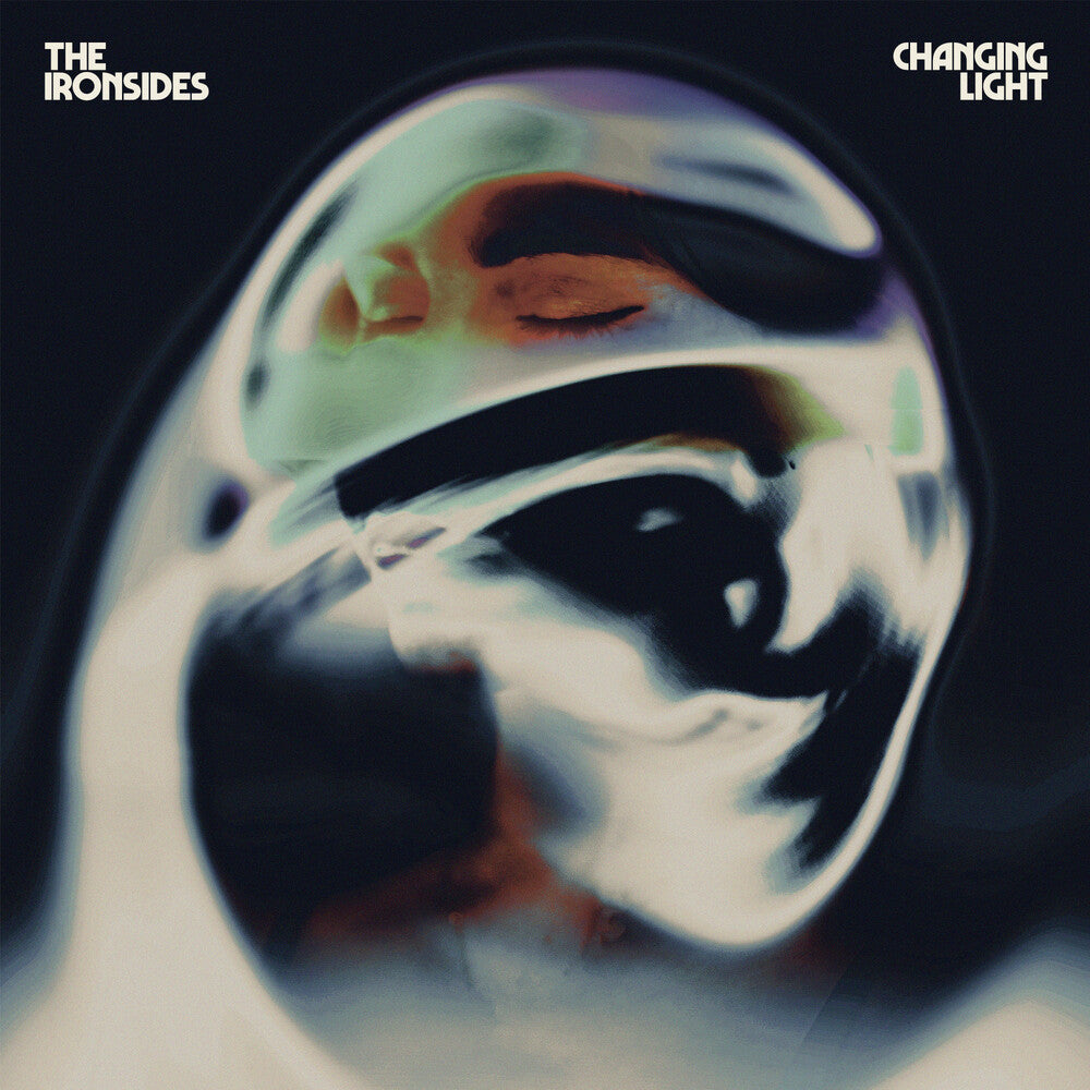 the album cover for The Ironsides - Changing Light [Transparent Blue W/ Black Swirl LP]