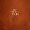 the album cover for The Wood Brothers - Heart is the Hero