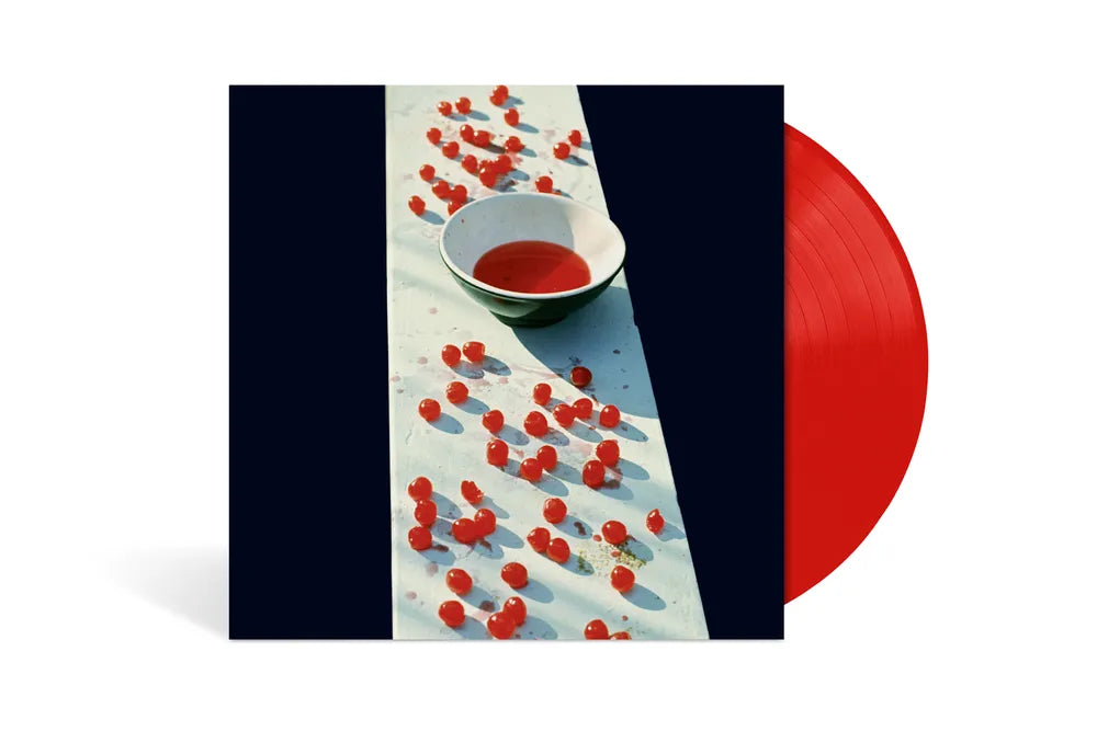 the album cover for Paul McCartney - McCartney (SHM CD) [Indie Exclusive Limited Edition Opaque Red LP]