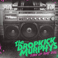the album cover for Dropkick Murphys - Turn Up That Dial [Indie Exclusive Limited Edition Coke Bottle Green LP]