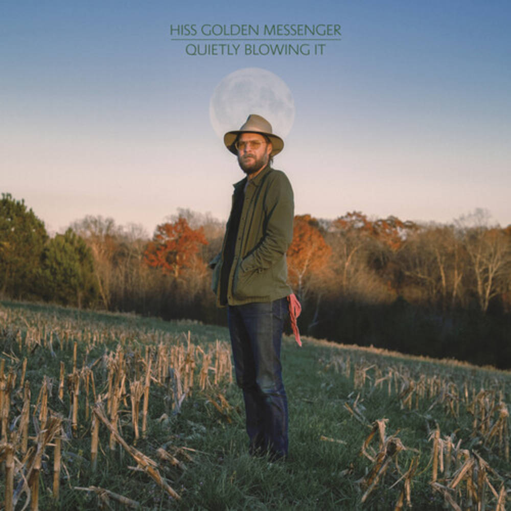the album cover for Hiss Golden Messenger - Quietly Blowing It [Indie Exclusive Limited Edition Metallic Blue LP]