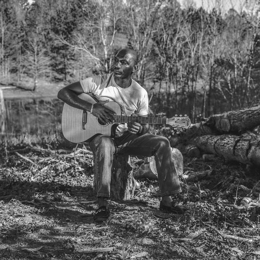 the album cover for Cedric Burnside - I Be Trying [Indie Exclusive Limited Edition Mississippi Flag LP]