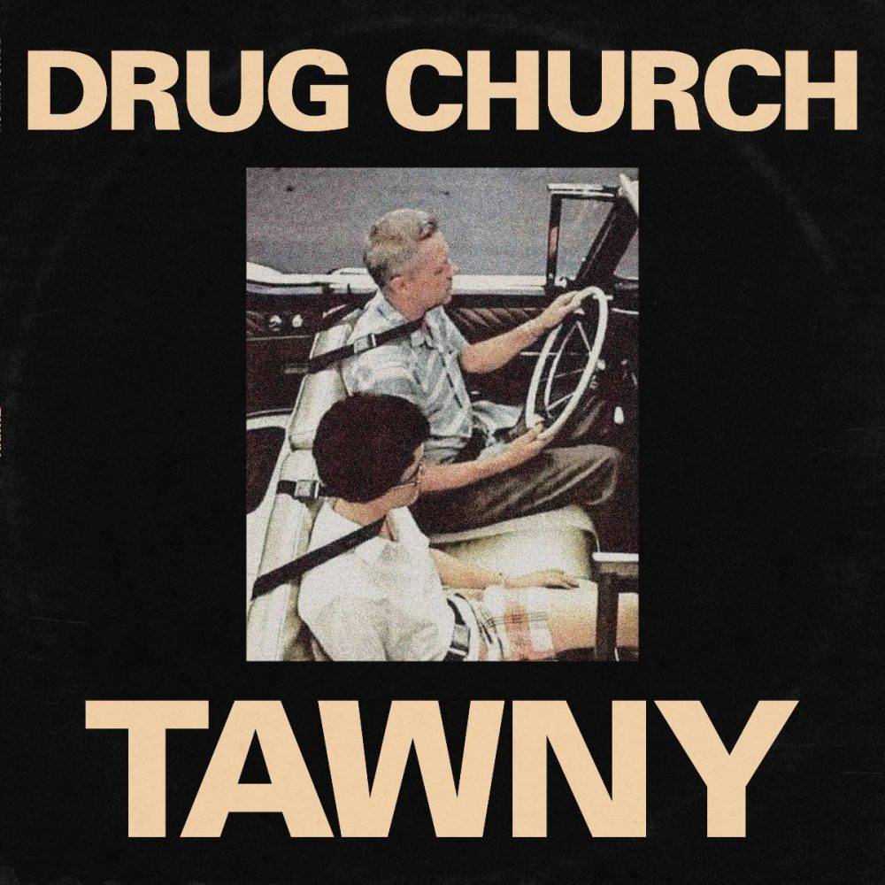 the album cover for Drug Church - TAWNY EP [Indie Exclusive Limited Edition Black in Beer with Heavy White Splatter Vinyl]