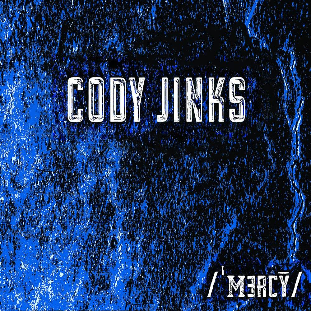 the album cover for Cody Jinks - Mercy [Translcuent Blue W/ Black Swirl LP]