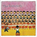 the album cover for The Raincoats - The Raincoats: 40th Anniversary Remaster [Indie Exclusive Limited Edition Opaque Yellow & Red Swirl LP]