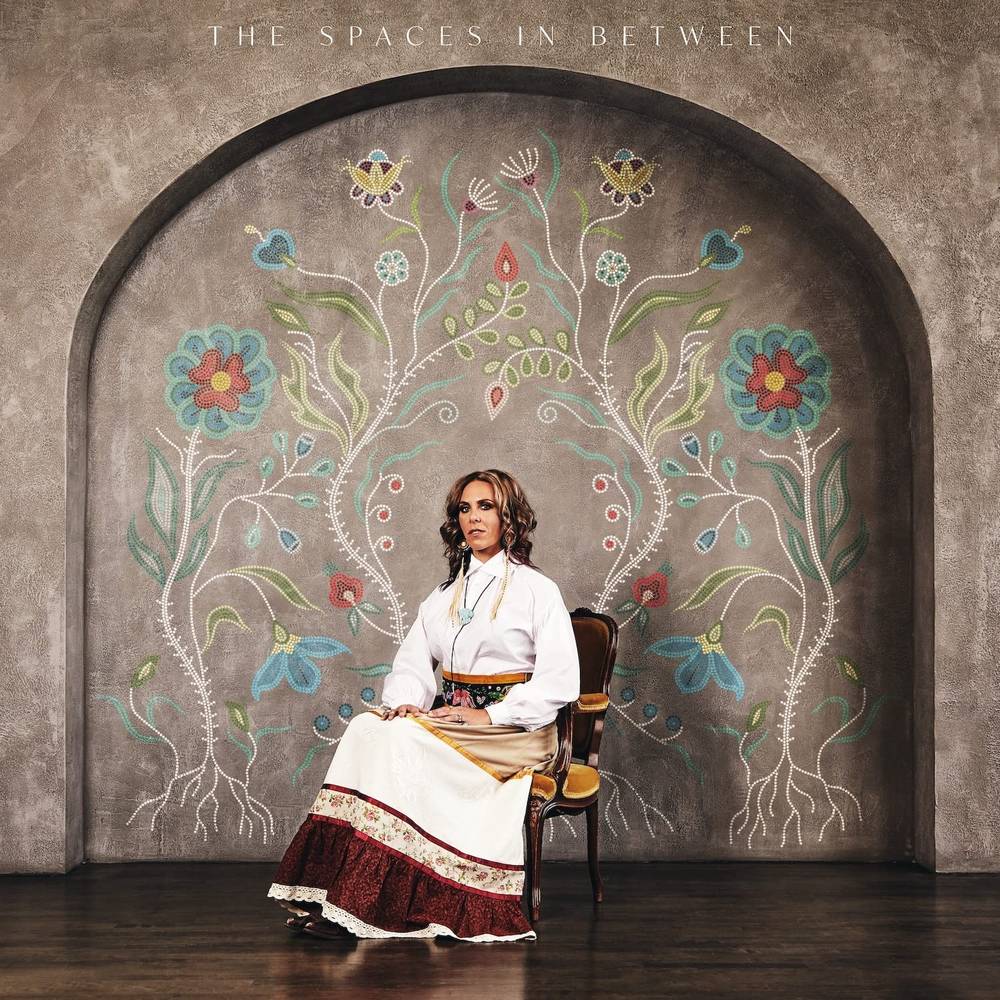 the album cover for Amanda Rheaume - The Spaces In Between